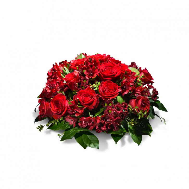 centro funerario flores rojas